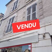 Immeuble - 1 fonds de commerce + 2 appartements - 172,76 m²