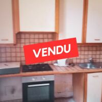Immeuble - 1 fonds de commerce + 2 appartements - 172,76 m²