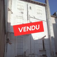 Immeuble - 1 fonds de commerce + 2 appartements - 172,76 m²