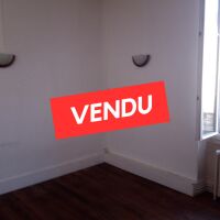 Immeuble - 1 fonds de commerce + 2 appartements - 172,76 m²