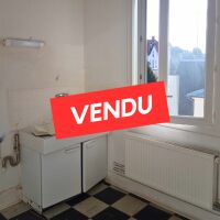 Immeuble - 1 fonds de commerce + 2 appartements - 172,76 m²